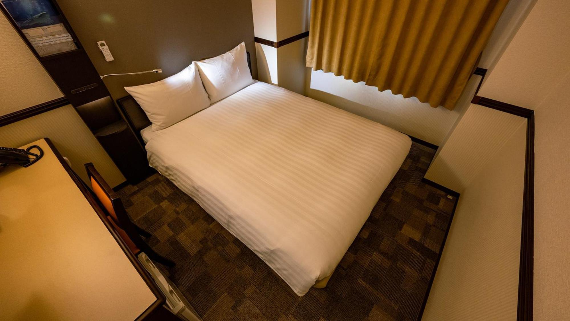 Toyoko Inn Shin-Osaka Higashi-Mikuni Ekimae Chambre photo