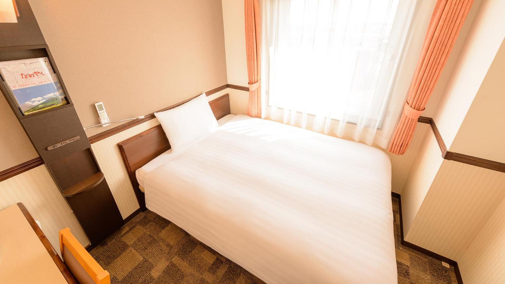 Toyoko Inn Shin-Osaka Higashi-Mikuni Ekimae Chambre photo