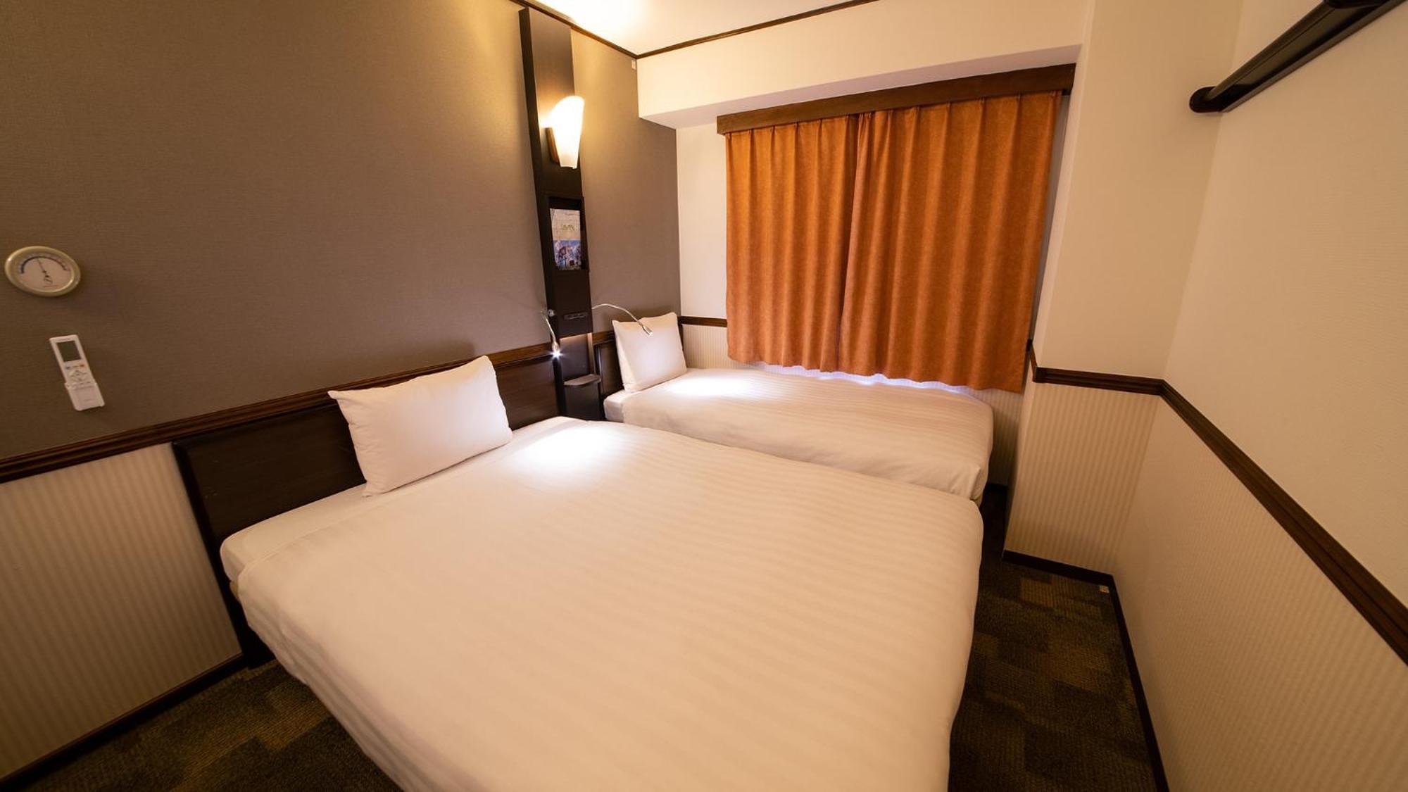 Toyoko Inn Shin-Osaka Higashi-Mikuni Ekimae Chambre photo