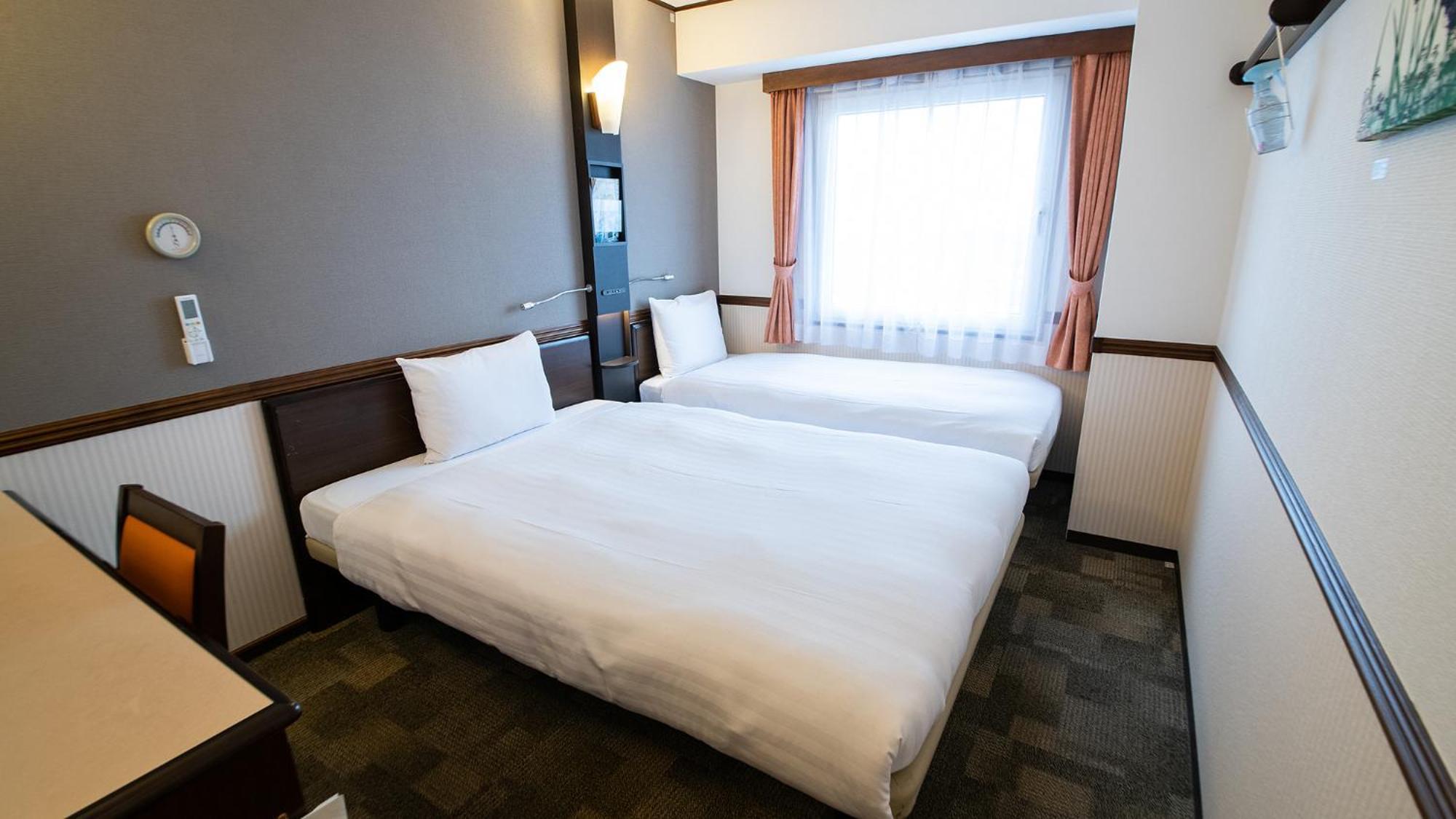 Toyoko Inn Shin-Osaka Higashi-Mikuni Ekimae Chambre photo